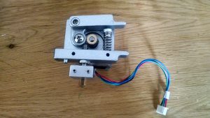 Print head heater block connected to the motor